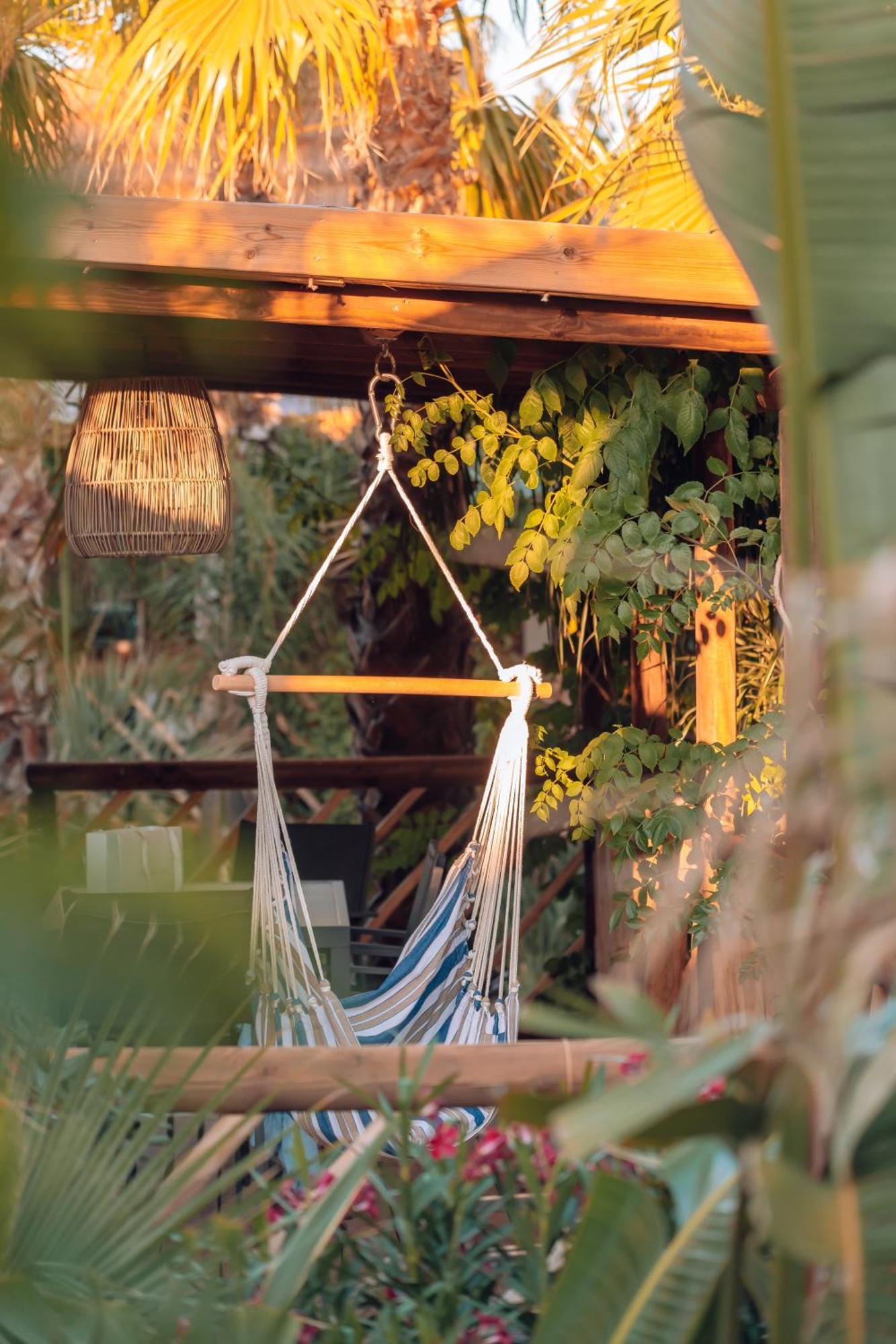 Toison D'Or Hotel รามาตูแอล ภายนอก รูปภาพ Hammock chair